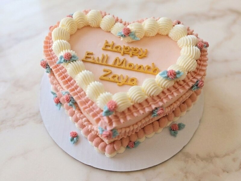 Heart shaped cake with vintage piping