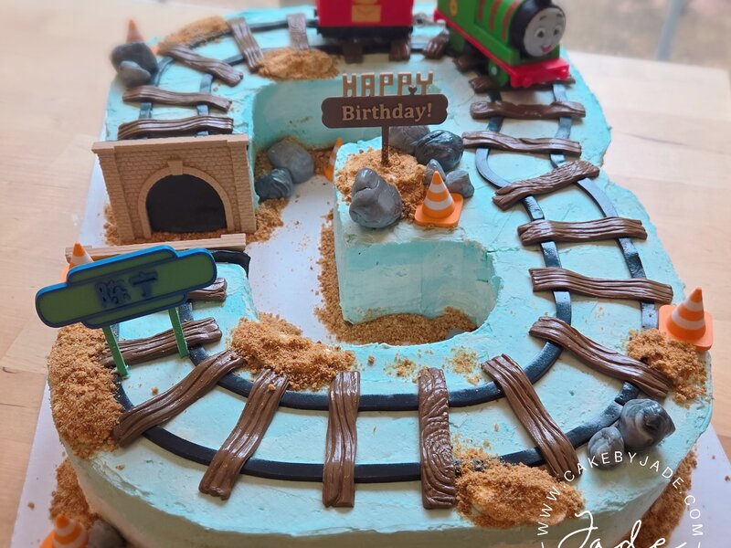 Number shaped cake — race track number 3 cake